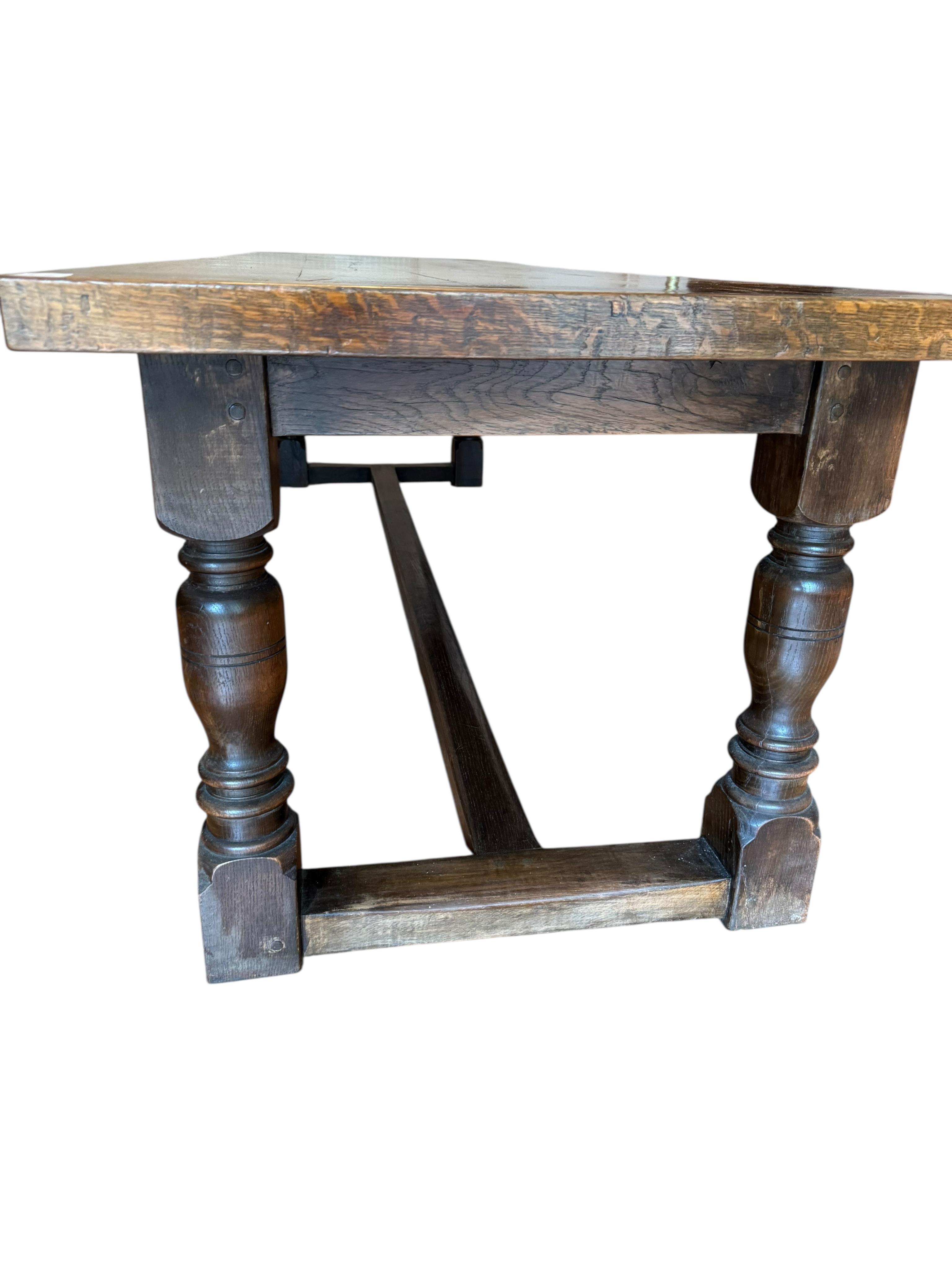 An 18th century style rectangular oak Bevan Funnel mahogany table, width 274cm, depth 83cm, height 74cm
